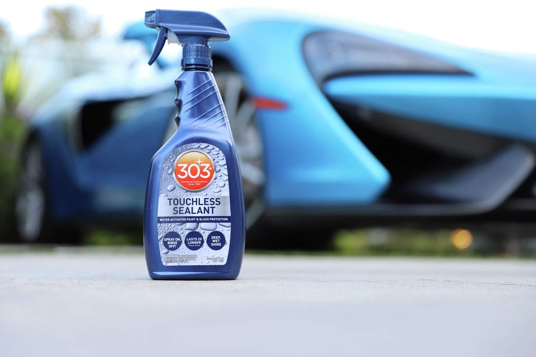 303 protected car in driveway demonstrating quick curb appeal