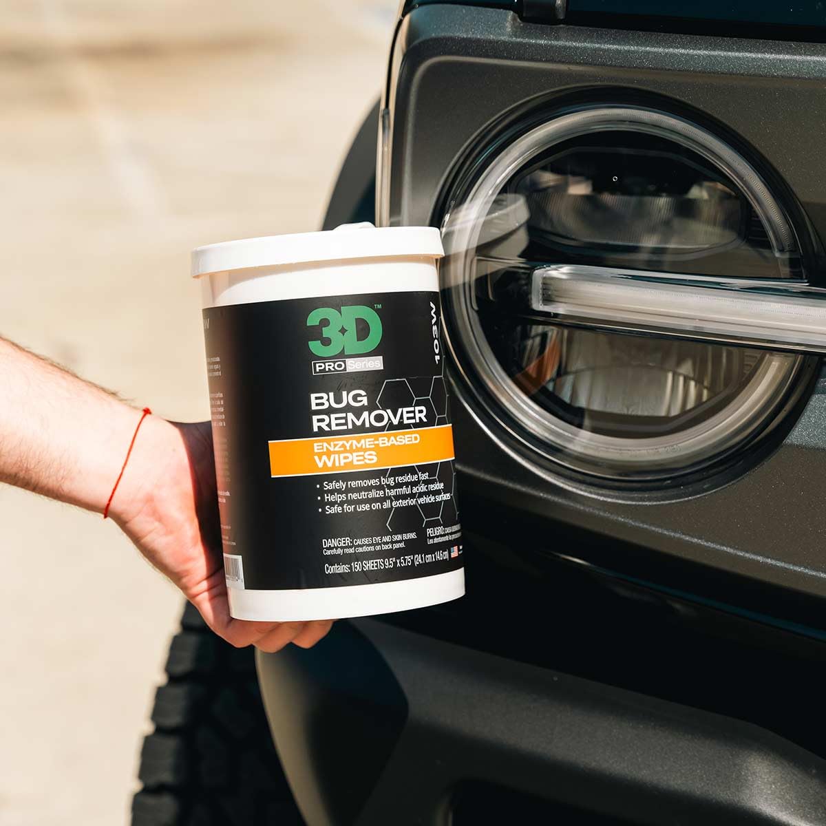 3D bug remover wipe in use on car hood removing insects for fast exterior touch-up