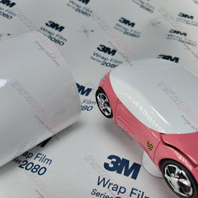 3M 2080 gloss white roll edge close-up showing film thickness and precise cut benefit