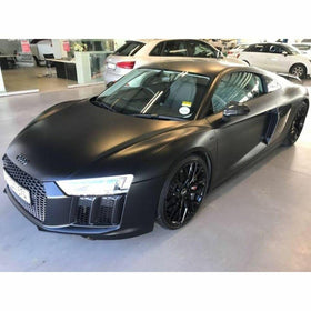 3M wrapped car hood in satin black demonstrating conformability to curved panels