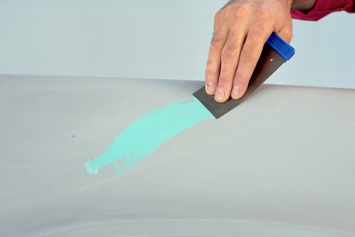 Close-up of 3M Acryl Putty texture spread on panel, smooth sanding result