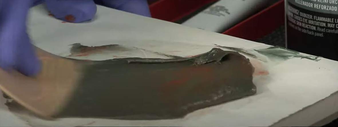 3M Bondo application with spreader showing easy shaping and coverage