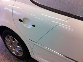 3M tape conforming around a car corner showing flexibility benefit