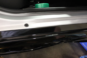 3M tape in installer hands during wrap job showing time-saving benefit