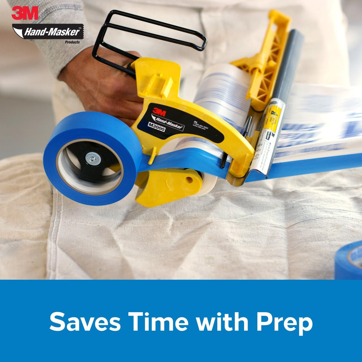 3M hand-masker applying tape and film together for clean edges