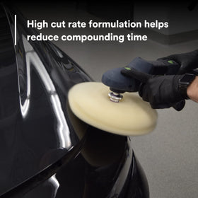 3M rubbing compound 05973 being applied to painted panel showing defect removal