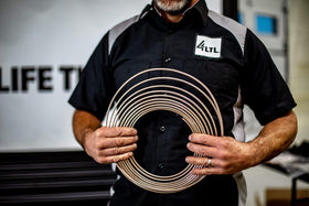 4LIFETIMELINES garage scene with technician using kit during classic car restoration for reliability