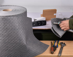 A A IN roll length comparison beside a tape measure showing 150-foot coverage
