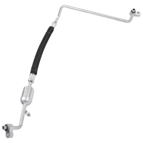 A-Premium discharge line on a workbench with tools showing professional-ready repair