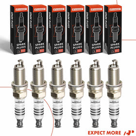 A-Premium technician installing spark plugs in garage illustrating easy DIY replacement
