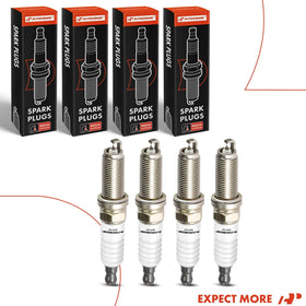 Mechanic installing A-Premium plug in garage showing practical, reliable replacement