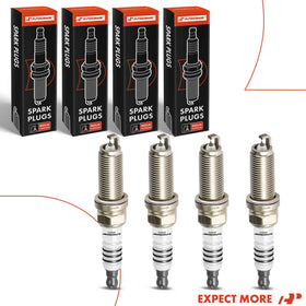 Mechanic installing A-Premium spark plugs in a garage demonstrating DIY maintenance benefit