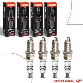 A-Premium spark plugs on workbench in a garage lifestyle shot showing practical use