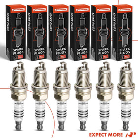 A-Premium spark plugs on a garage workbench conveying professional maintenance benefit