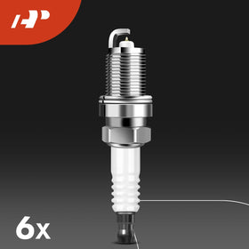 A-Premium kit held in hand showing scale and compact coil and spark plug sizes