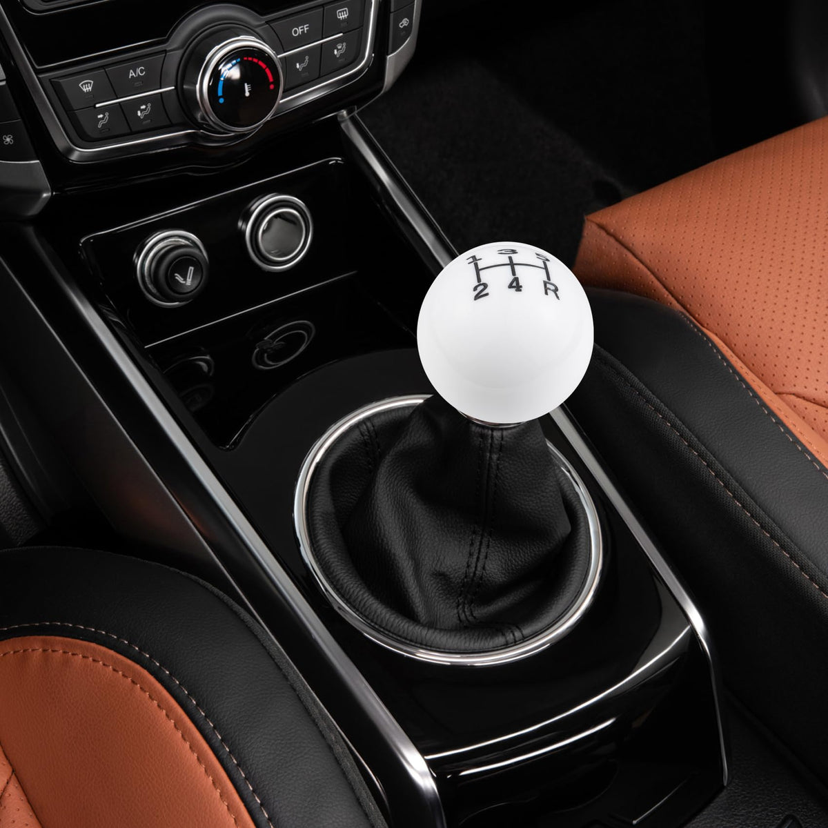 Abfer ball shift knob held in hand demonstrating size and ergonomic benefit