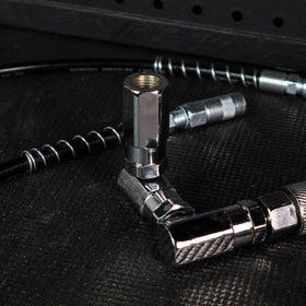 ABN 4-jaw coupler engaged on grease nipple ensuring secure seal and leak reduction