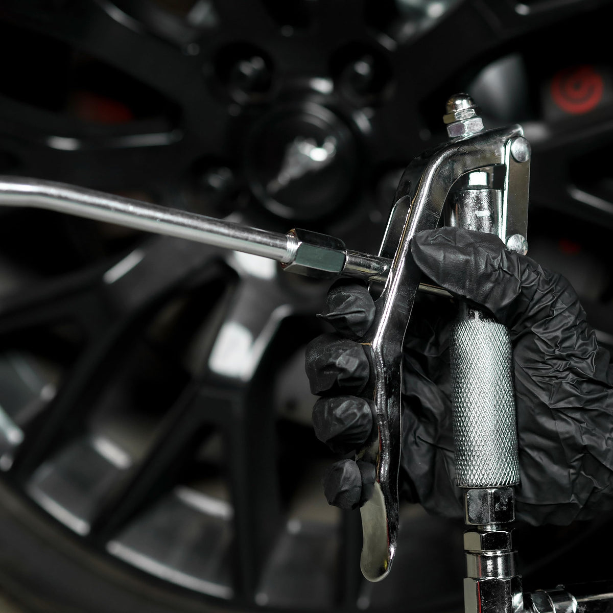 ABN control handle with 11-inch trigger in hand for ergonomic single-handed operation