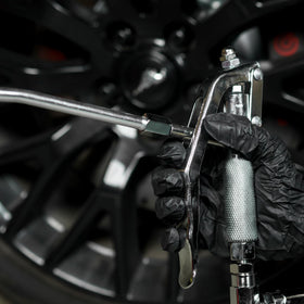 ABN control handle with 11-inch trigger in hand for ergonomic single-handed operation
