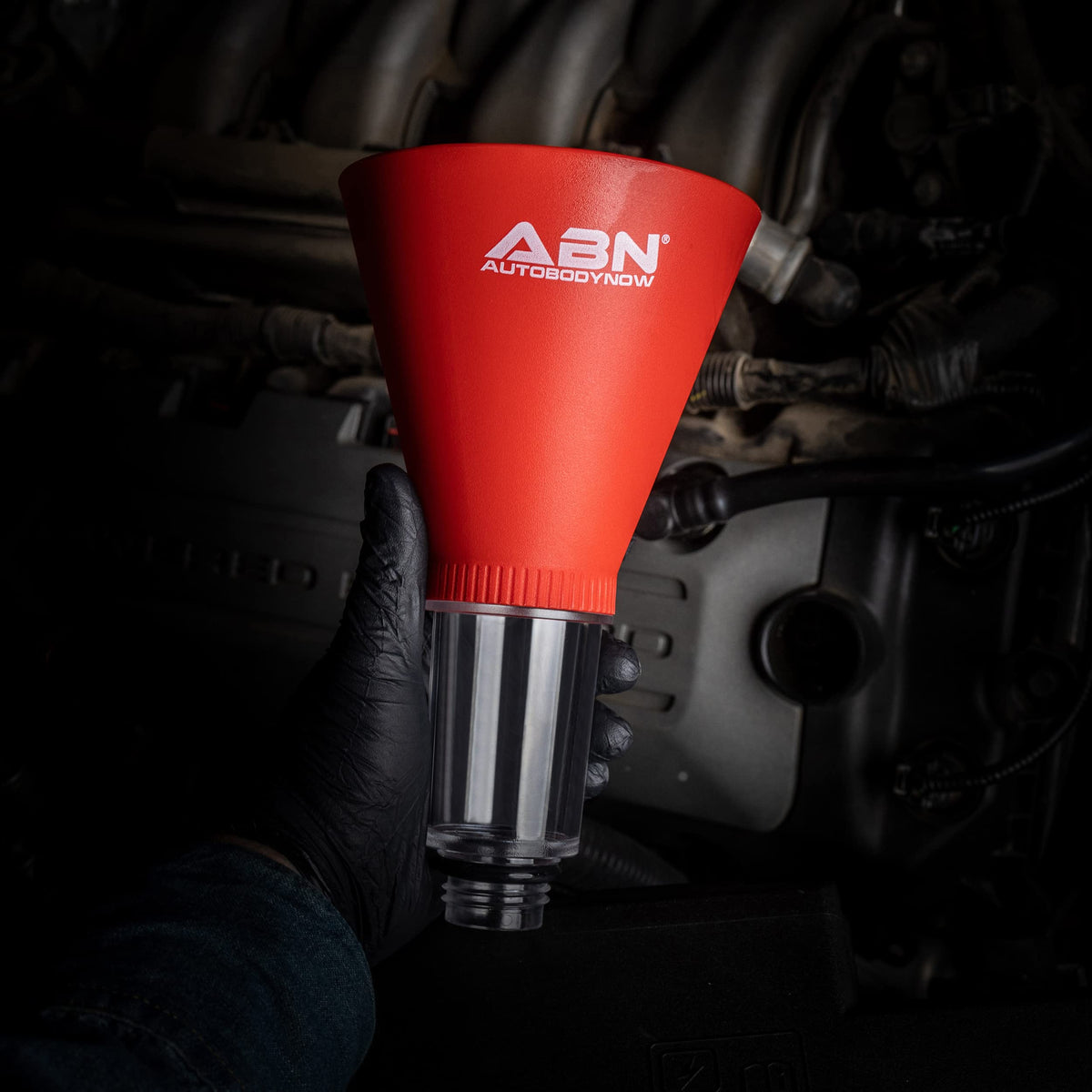 ABN funnel with bottle pouring oil smoothly, prevents mess and drips