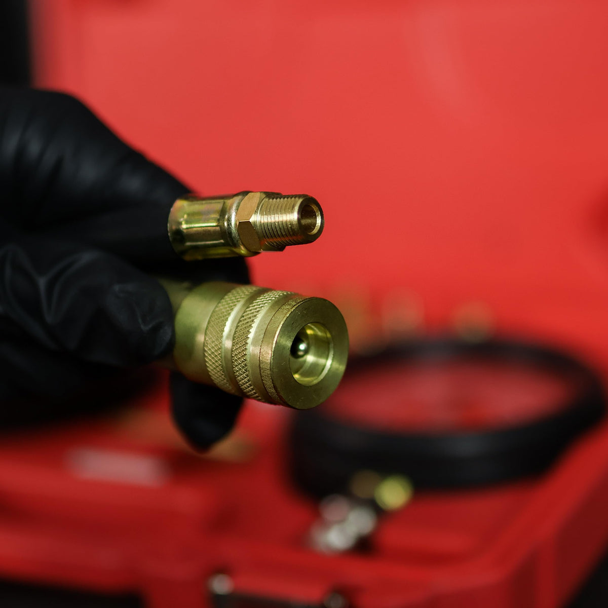 ABN pressure gauge connected in an engine bay illustrating diagnostic convenience