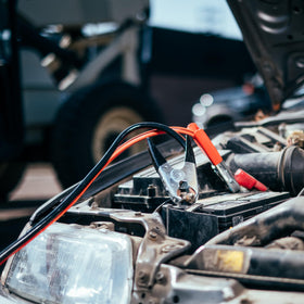 ABN coiled cables stored in trunk illustrating tangle-free convenience benefit