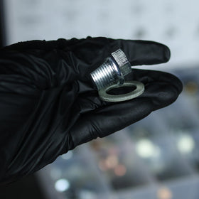 ABN plugs beside a coin showing compact sizes and portability