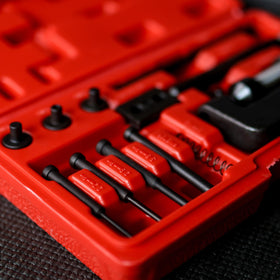 ABN size comparison next to ruler showing compact tools and scale