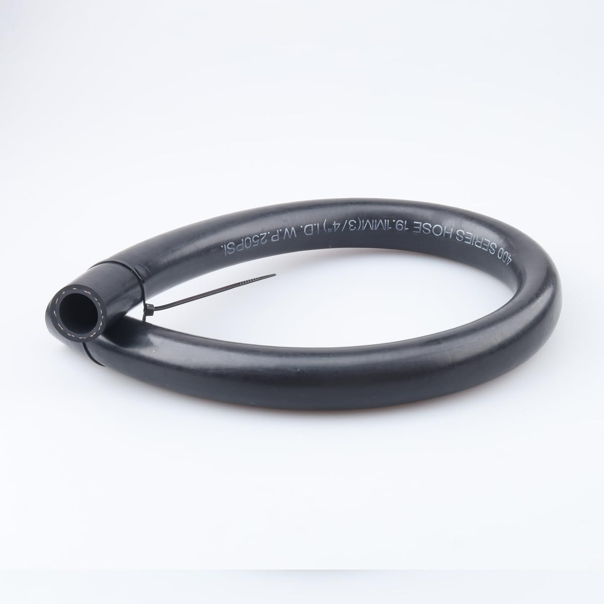 AC PERFORMANCE close-up of hose end and textile reinforced cover, highlights durable build