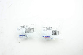 1A Auto AC DELCO sensors beside tools for accurate size and fit comparison