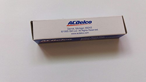 ACDelco spark plug beside ruler for scale showing correct dimensions and fitment clarity