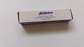 ACDelco spark plug beside ruler for scale showing correct dimensions and fitment clarity