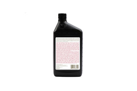 ACDelco bottle pouring lubricant into differential for clean professional service