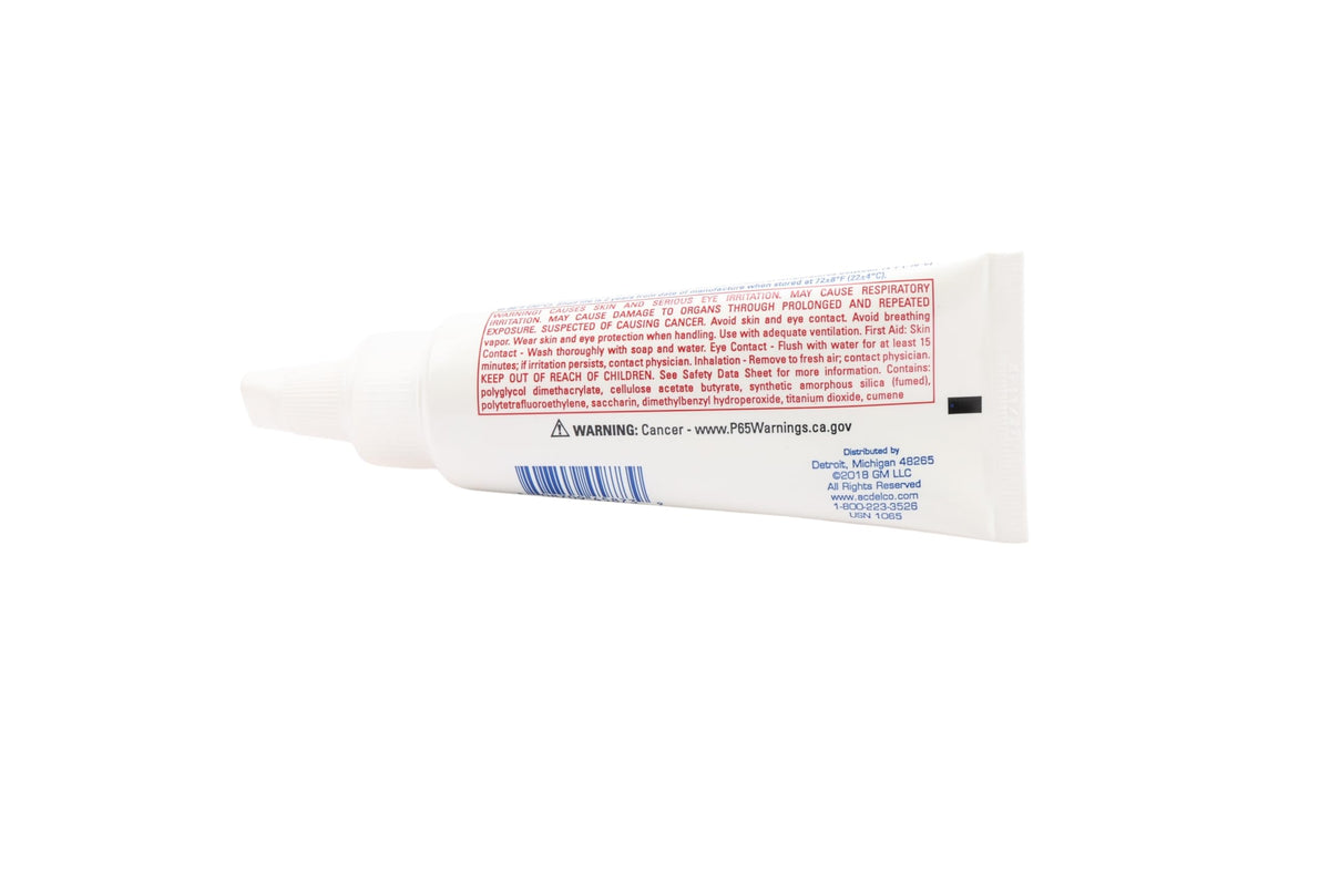ACDelco sealant applied to metal pipe fitting demonstrating leak prevention