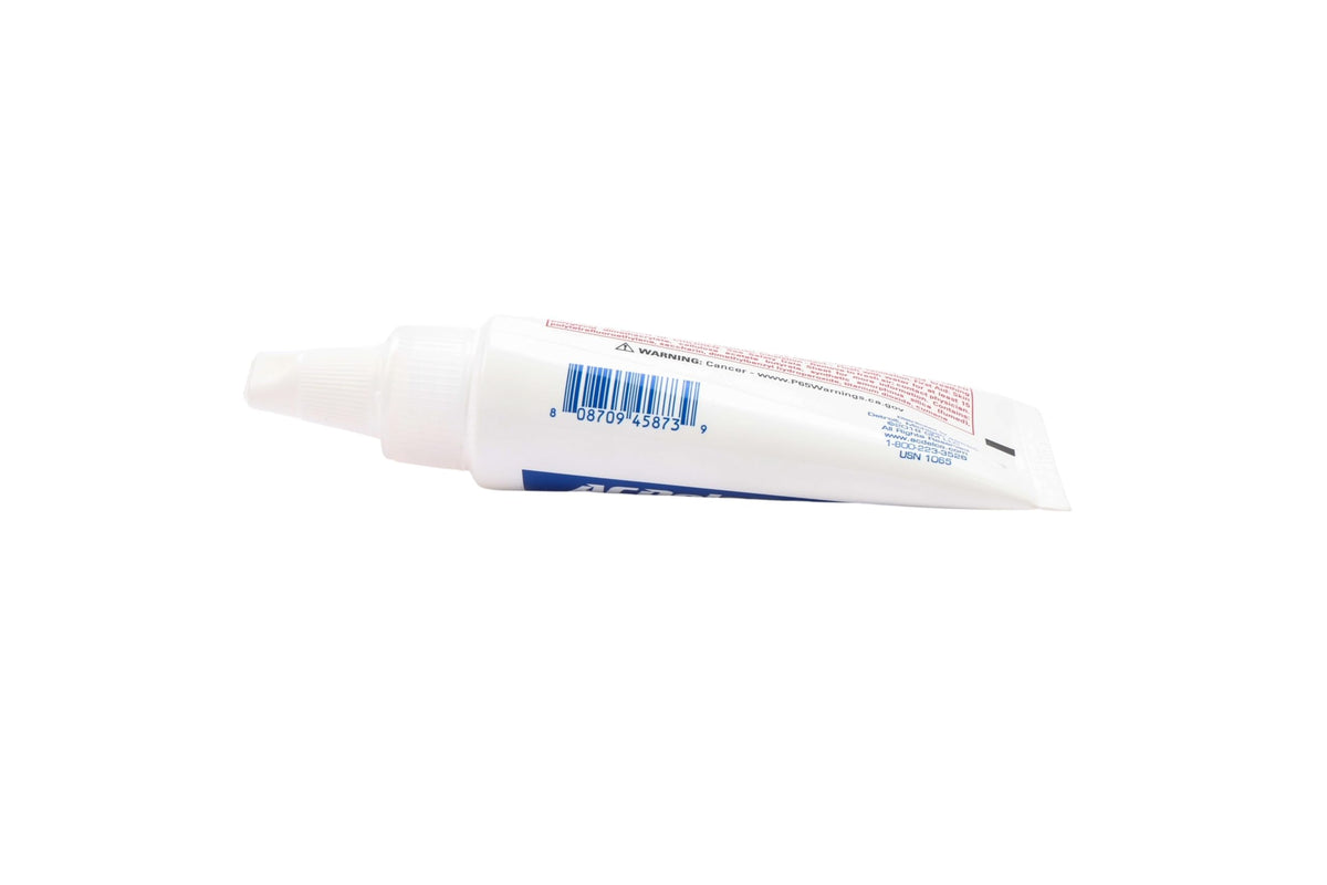 ACDelco 1.69 oz tube beside ruler showing compact size for shop use