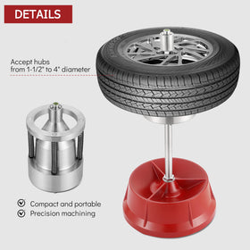 Acymner balancer in use mounted on car wheel for quick balancing