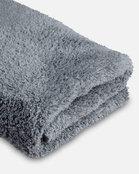 Adam's Borderless grey towel drying a pet showing gentle, high-absorbency care