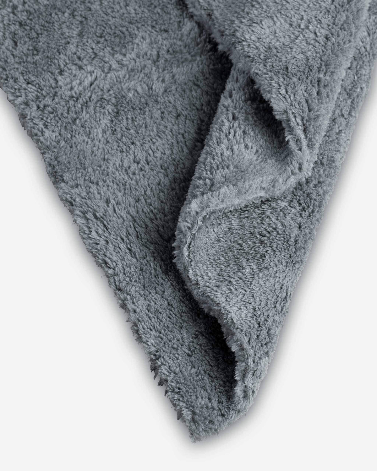 Adam's Borderless grey towel in hand demonstrates 16x16 size and handling ease
