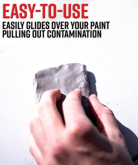 Adam's Polishes clay bar in use on car door with lubricant for scratch-free glide