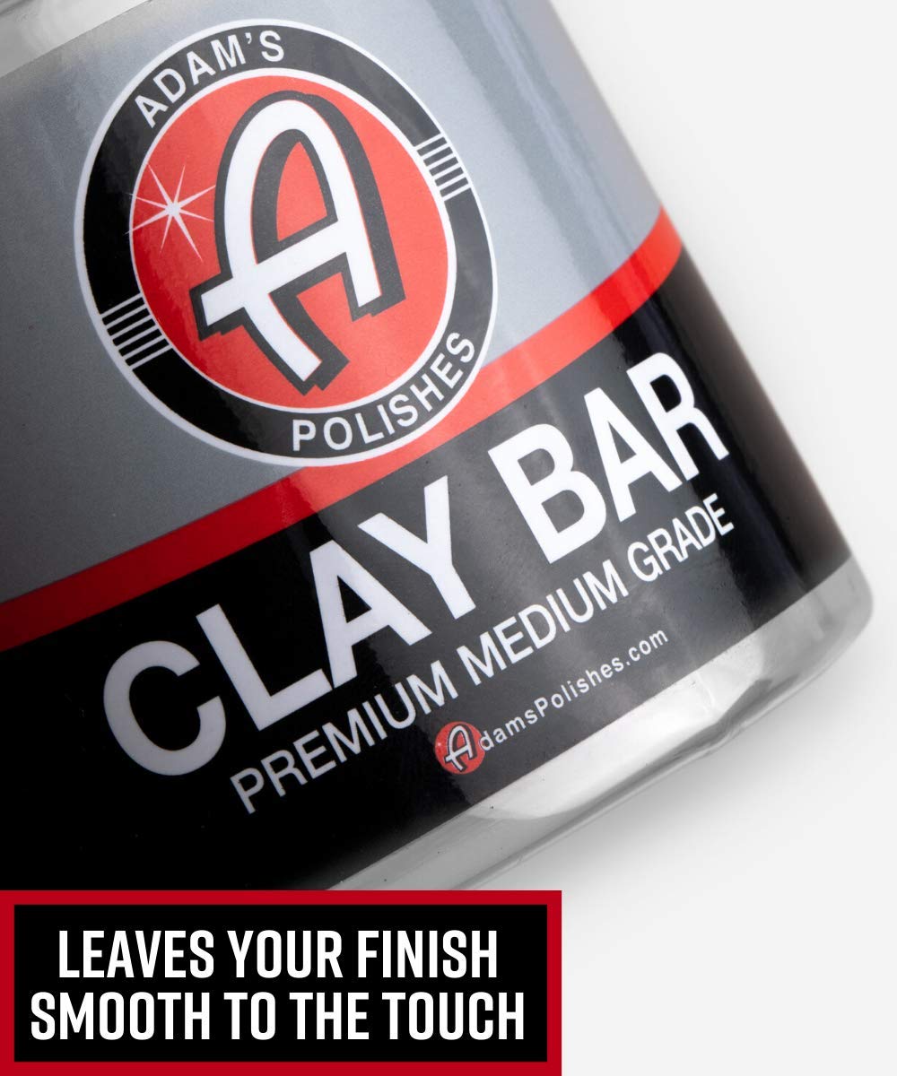 Adam's Polishes clay bar in hand demonstrating safe pressure and comfortable grip benefit
