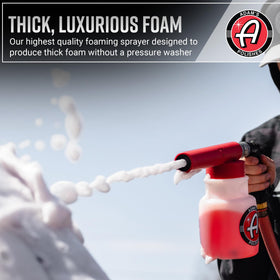 Adam's Polishes foam gun spraying foam onto SUV for efficient pre-wash cleaning