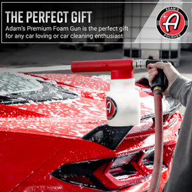 Adam's Polishes foam gun used in driveway wash scene illustrating convenient home use