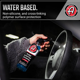 Adam's Polishes cleaning glass panel with streak-free clarity benefit