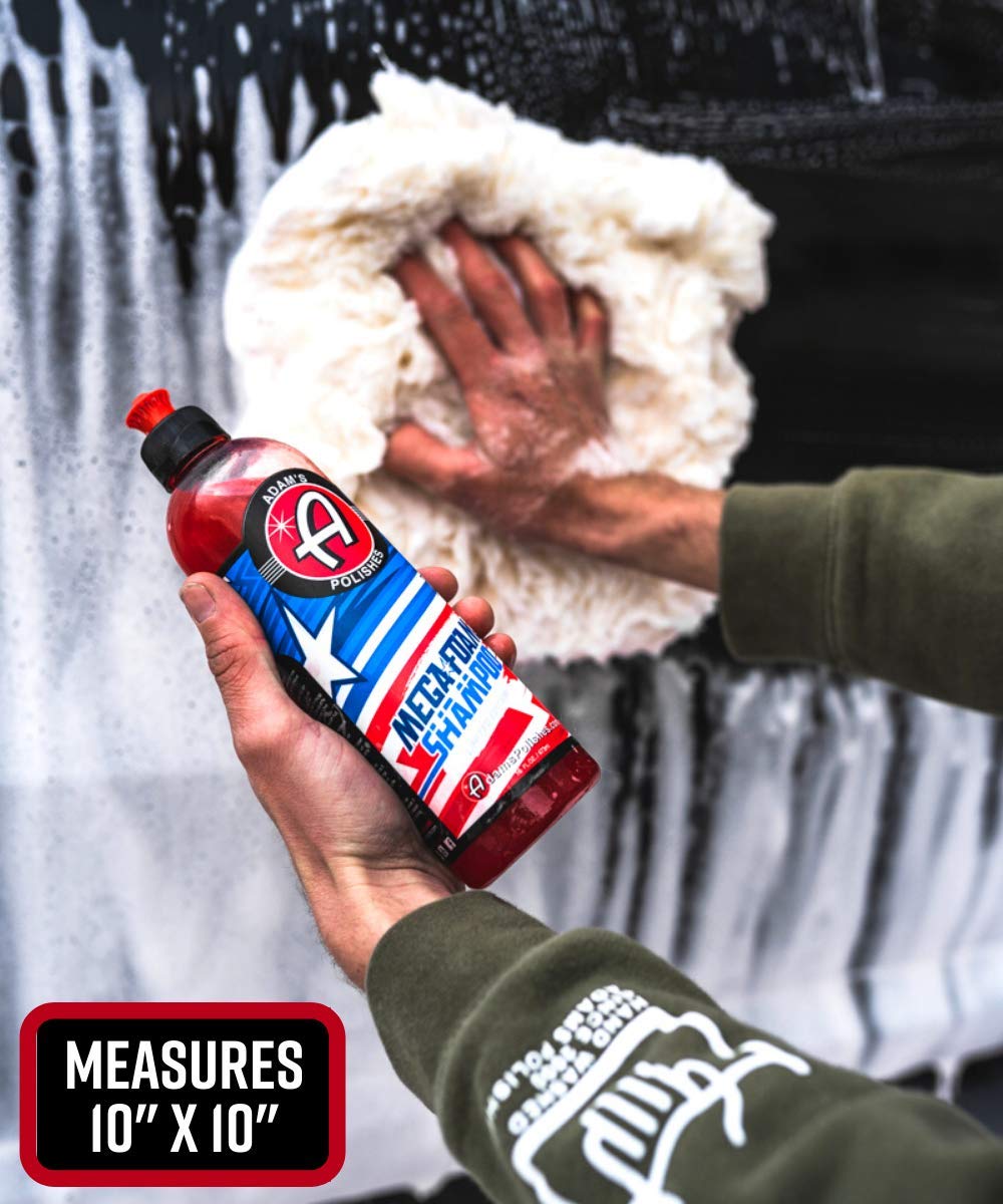 Adam's Polishes pad in a driveway wash scene showing efficient, scratch-safe washing