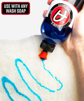 Adam's Polishes wash pad held in hand demonstrating comfortable grip and control
