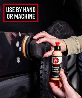Adam's Polishes bottle next to hand for size scale showing compact convenience benefit