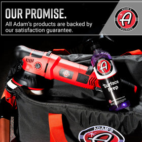Adam's Polishes bottle on a garage bench highlighting professional use benefit