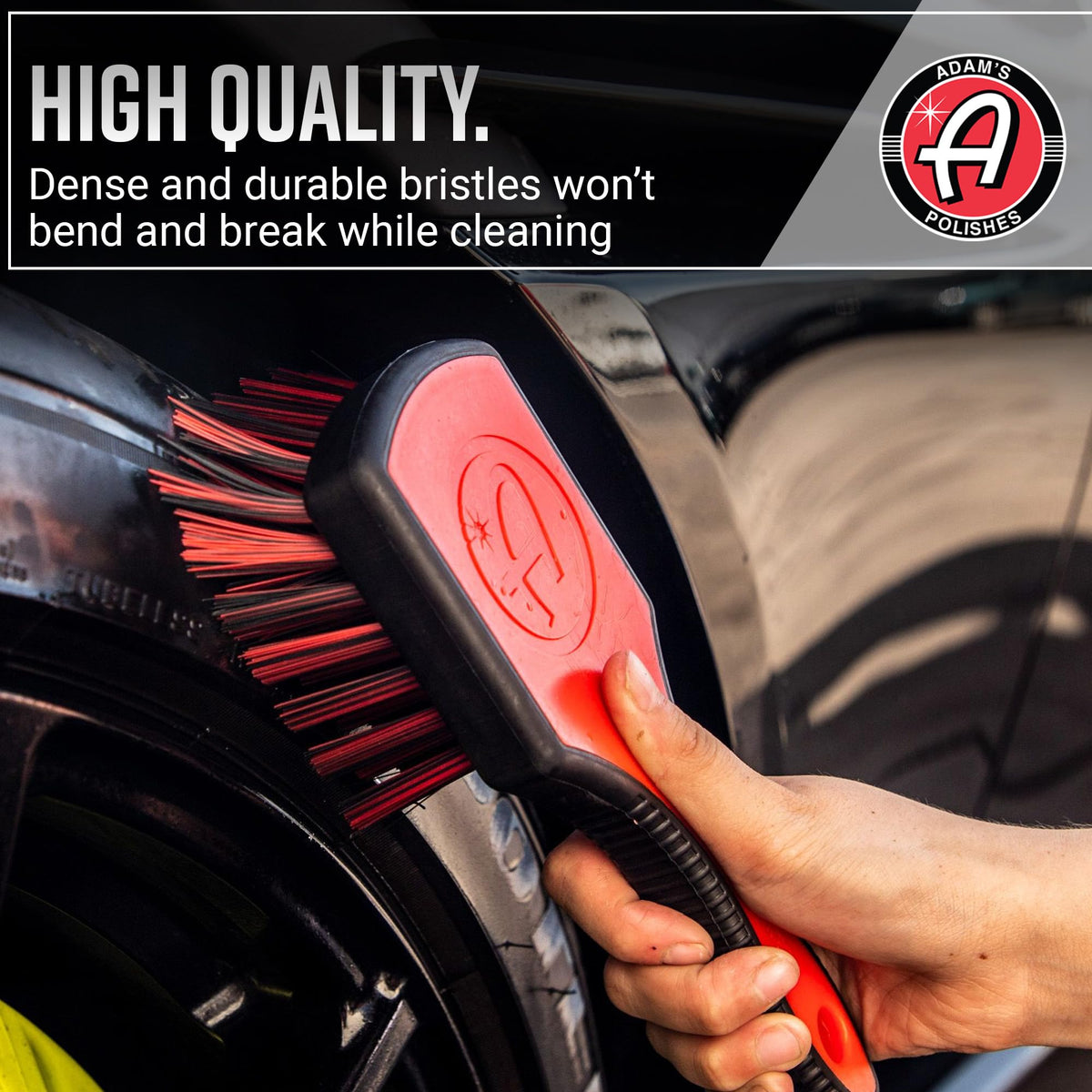 Adam's Polishes close-up of stiff bristles cleaning deep tire grooves effectively