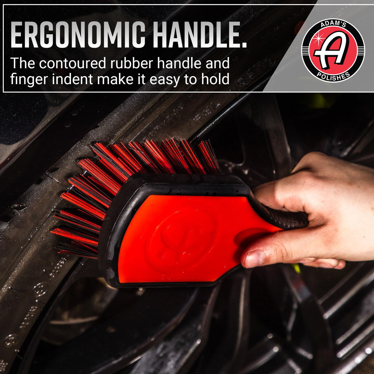 Adam's Polishes brush in use on tire sidewall removing grime and oxidation