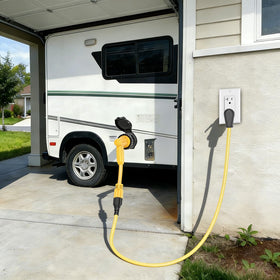 ADCAUDX adapter in use at RV shore power inlet demonstrating reduced inlet strain